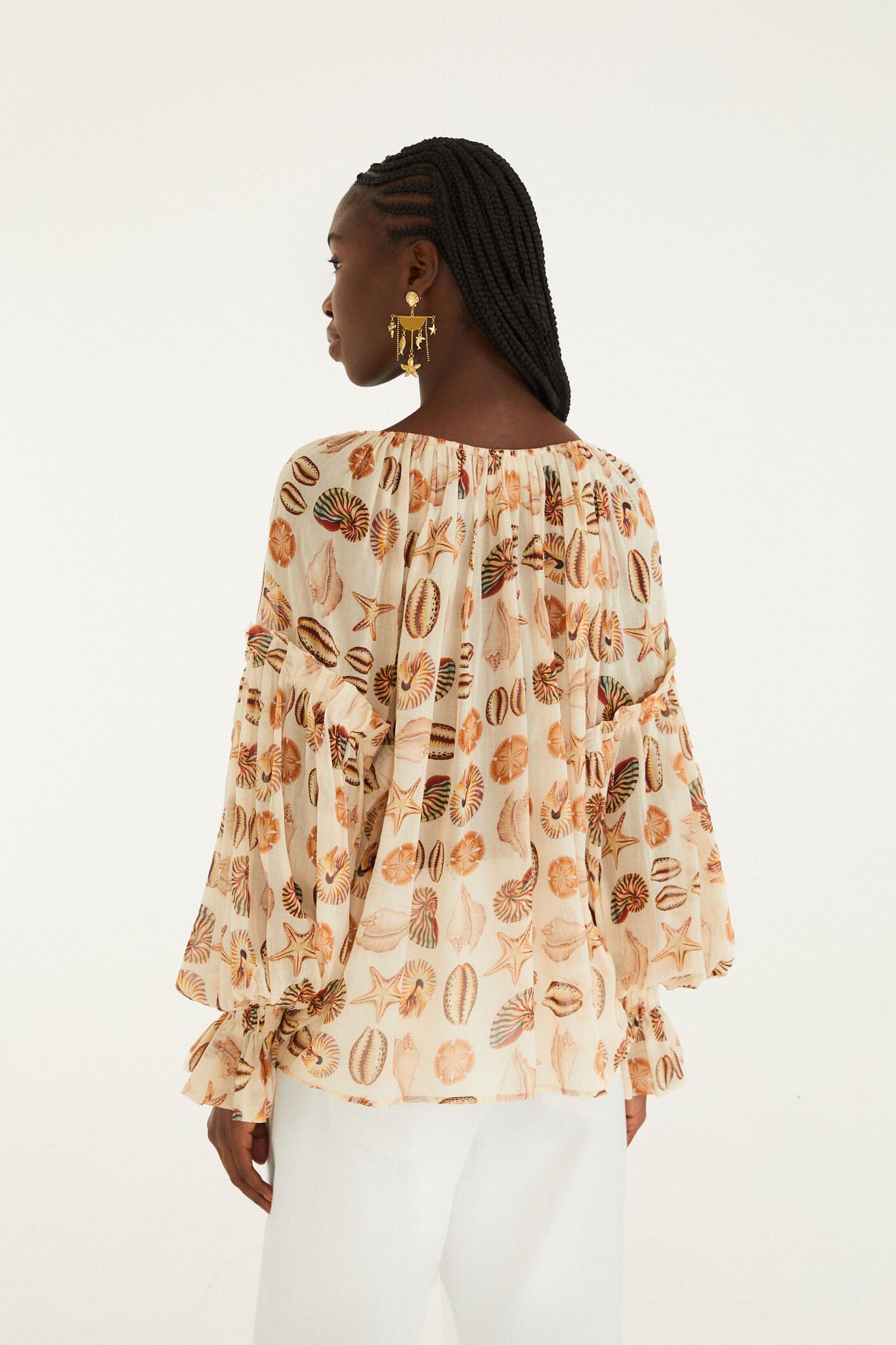 FARM Rio model wearing the Sand Marine Shells Beaded Ties Blouse