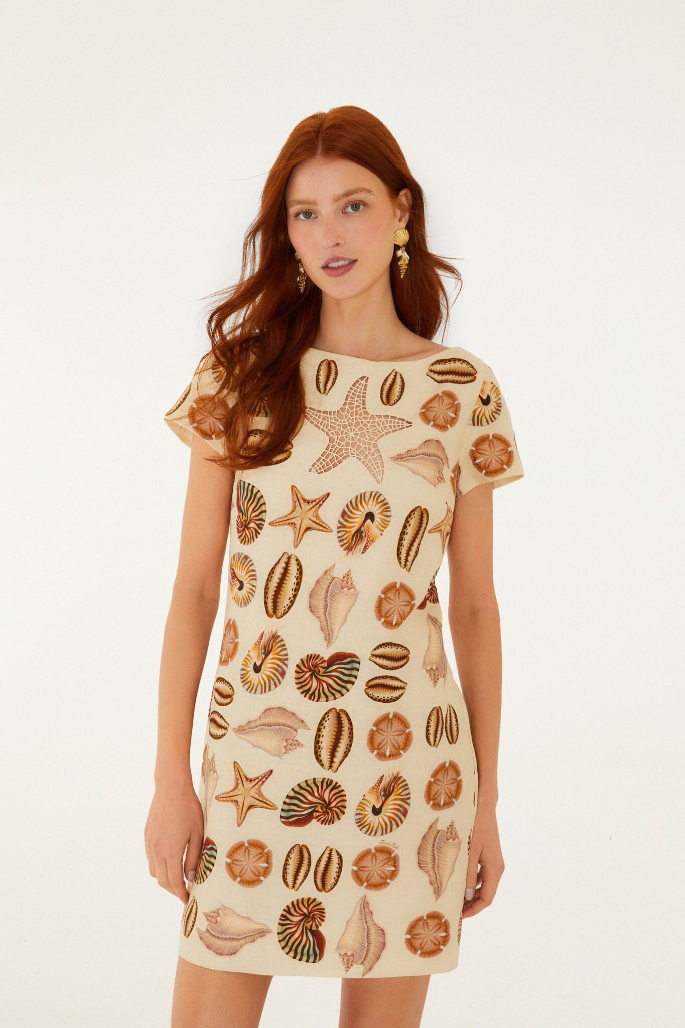 FARM Rio model wearing the Sand Marine Shells Short Sleeve Mini Dress