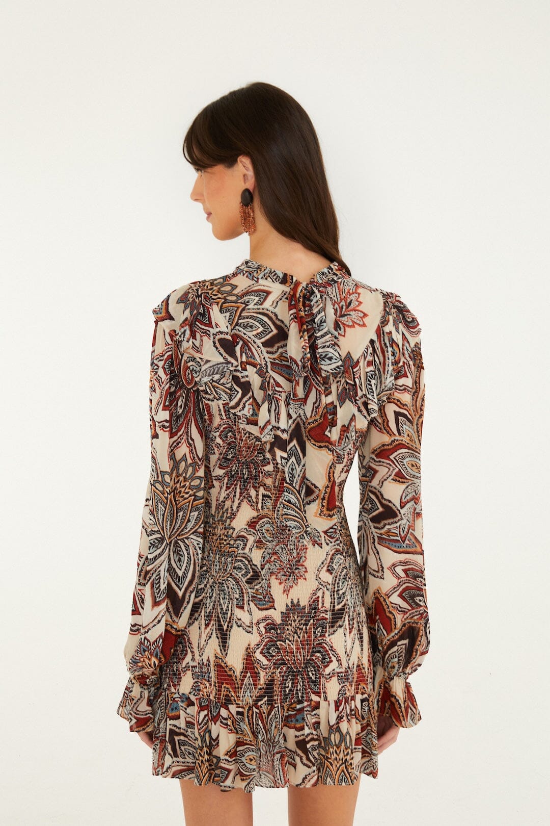 FARM Rio model wearing the Tapestry Flowers Long Sleves Mini Dress
