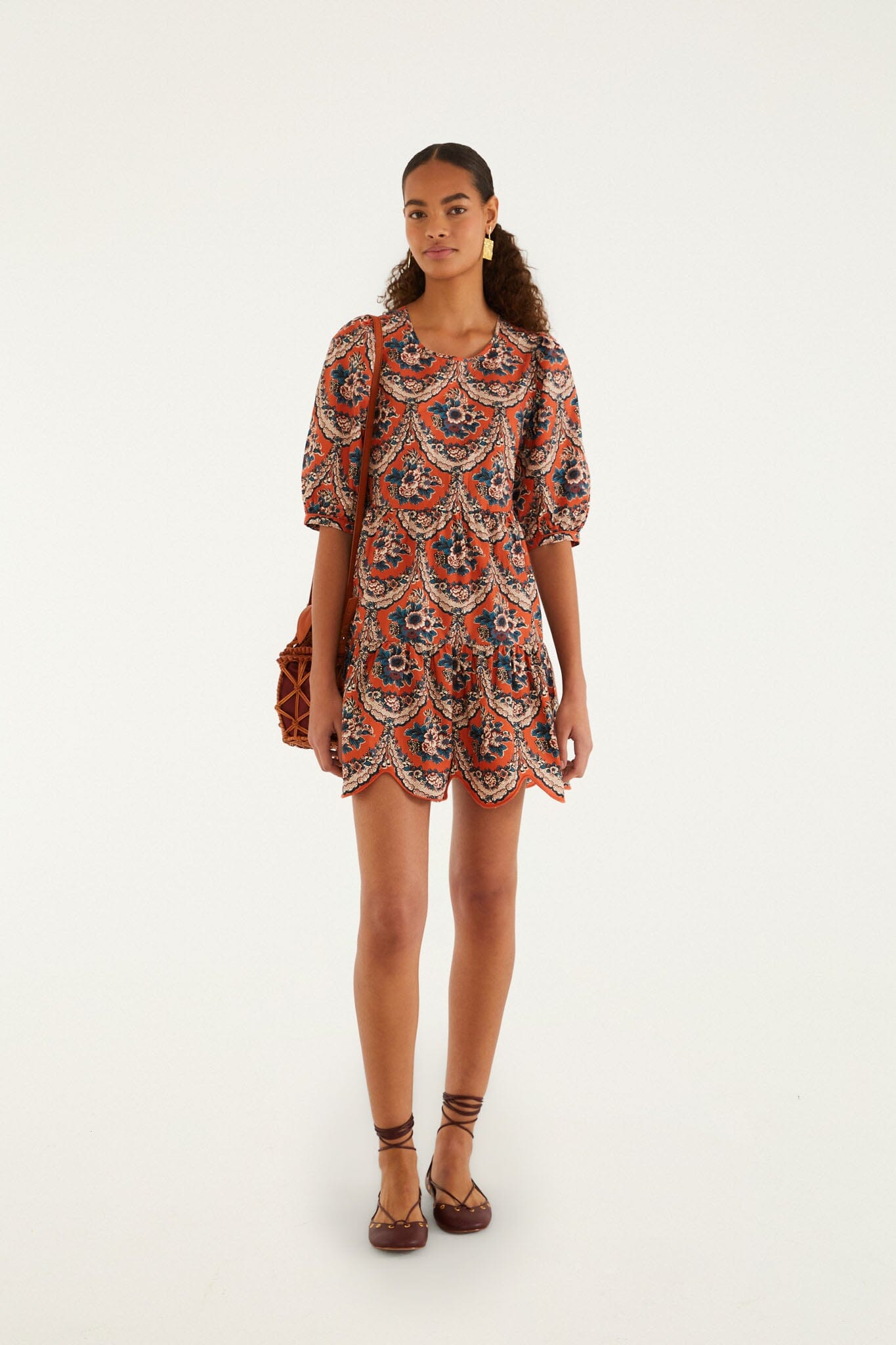 FARM Rio model wearing the Terracotta Victorian Floral Puff Sleeve Mini Dress