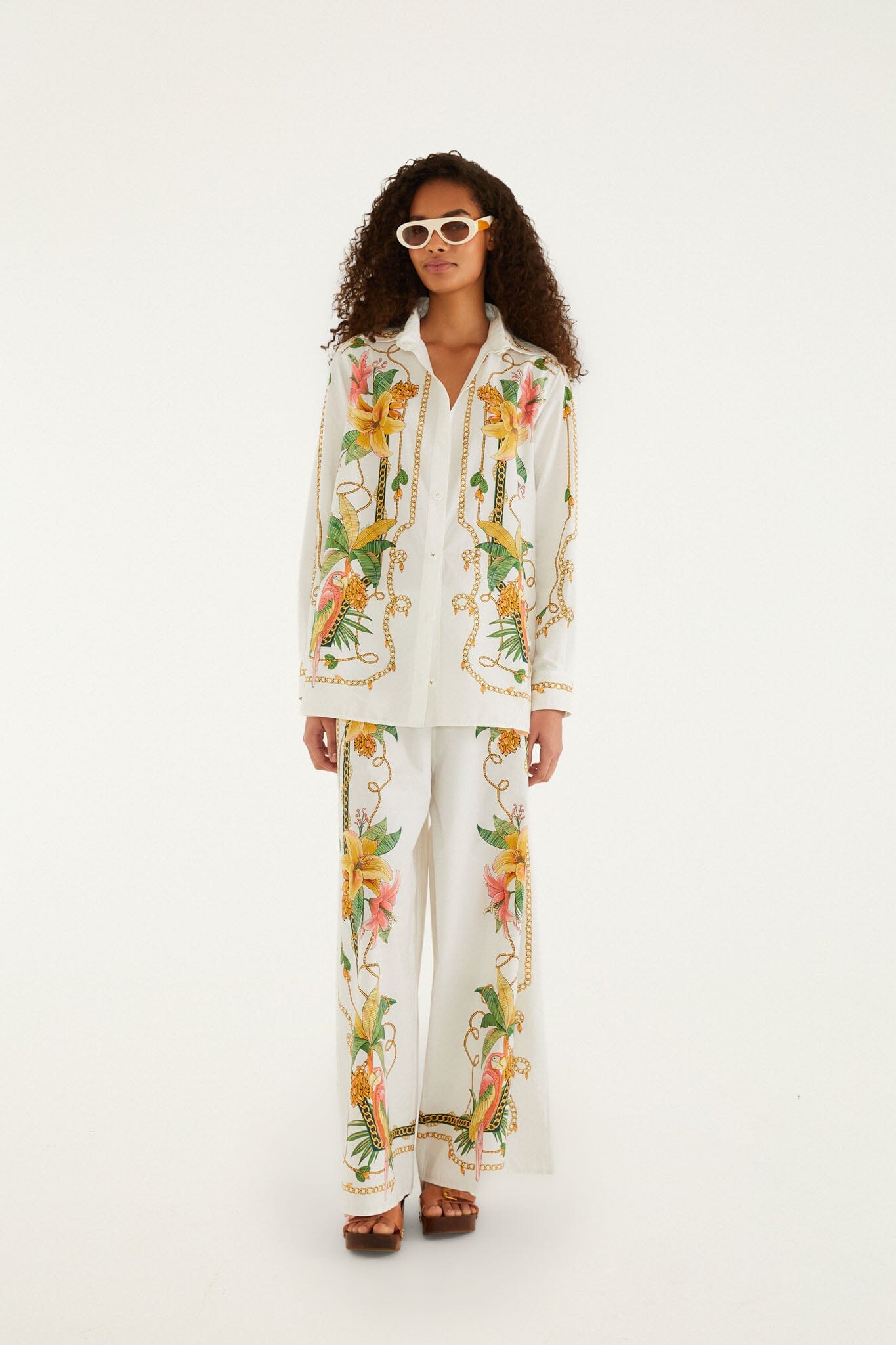 FARM Rio model wearing the Tropical Royalty Off-White Pants