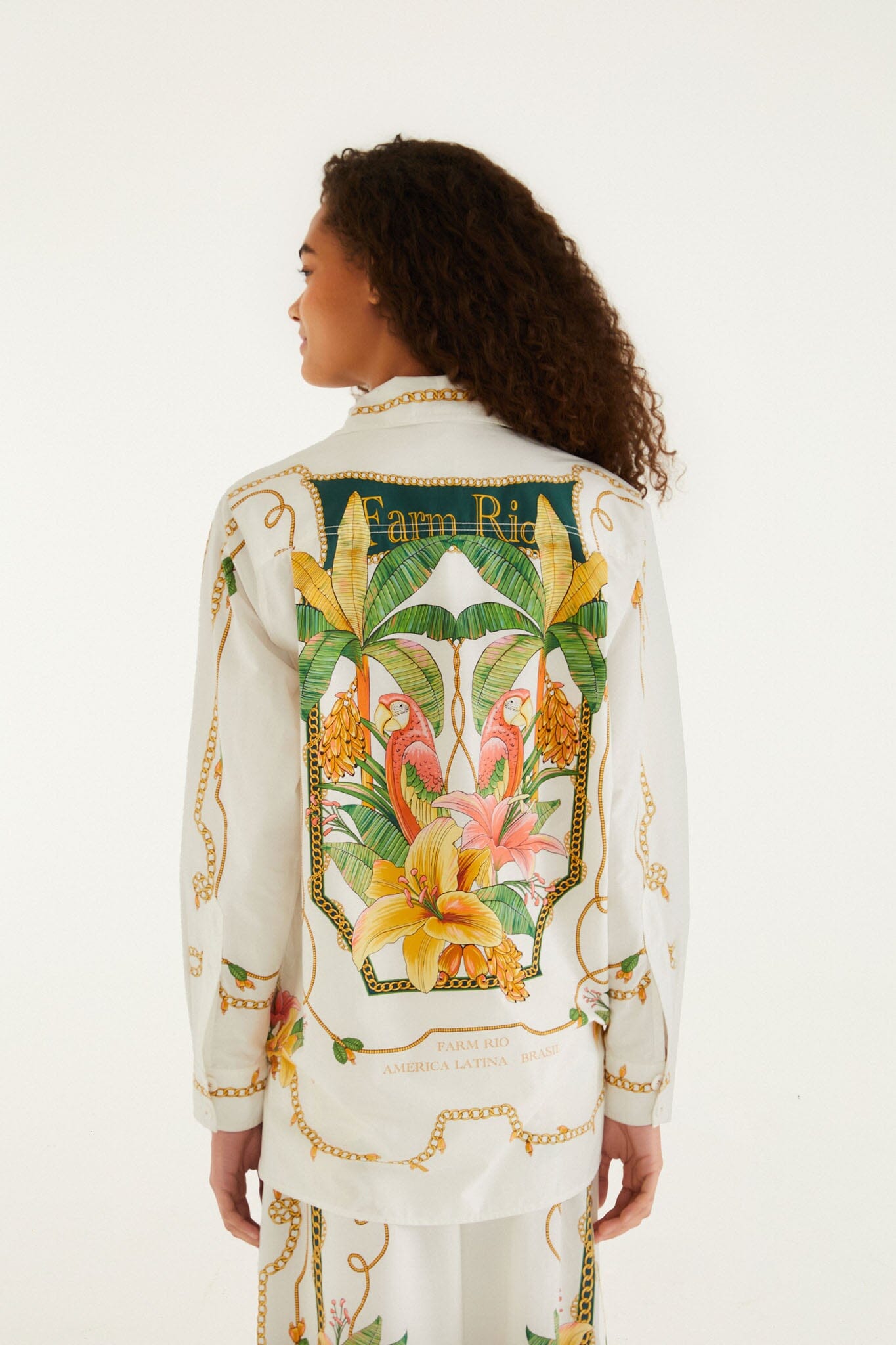 FARM Rio model wearing the Tropical Royalty Off-White Shirt Long Sleeve
