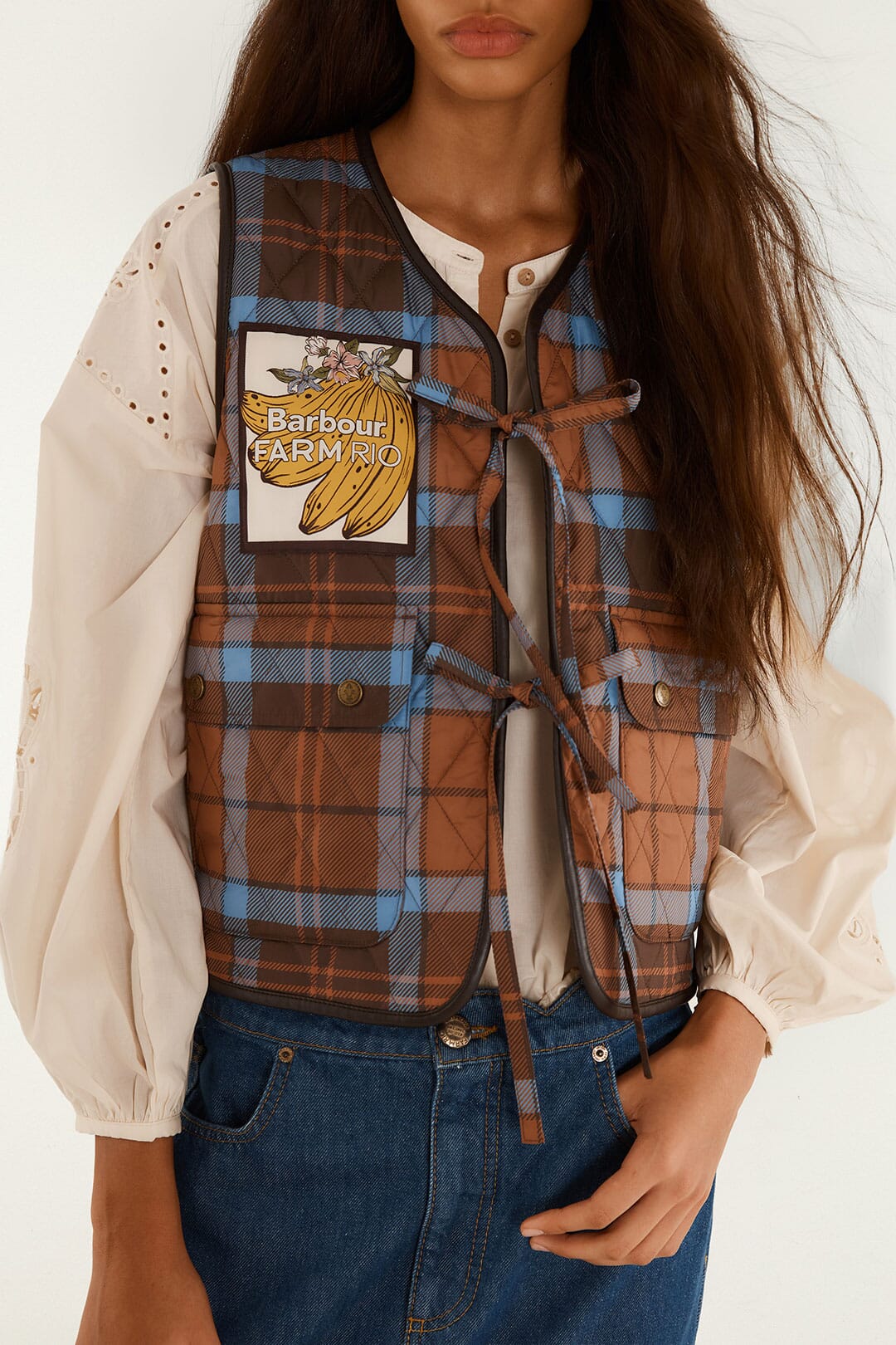 FARM Rio model wearing the Tropical Tea Gilet Vest