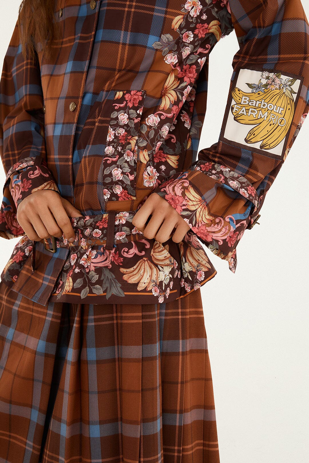 FARM Rio model wearing the Tropical Tea Raincoat