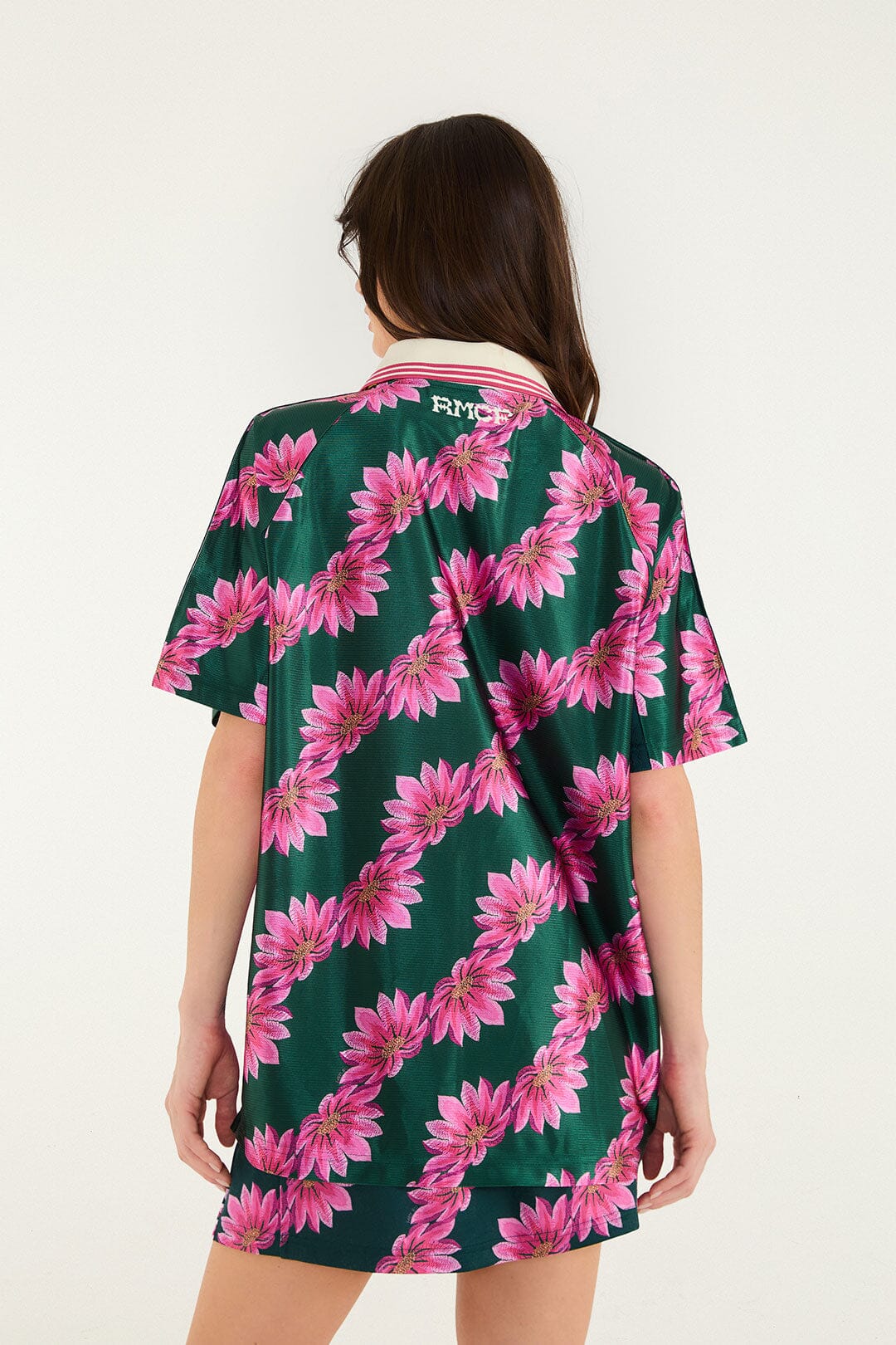 FARM Rio model wearing the Tshirt Adidas Flowerbana Green