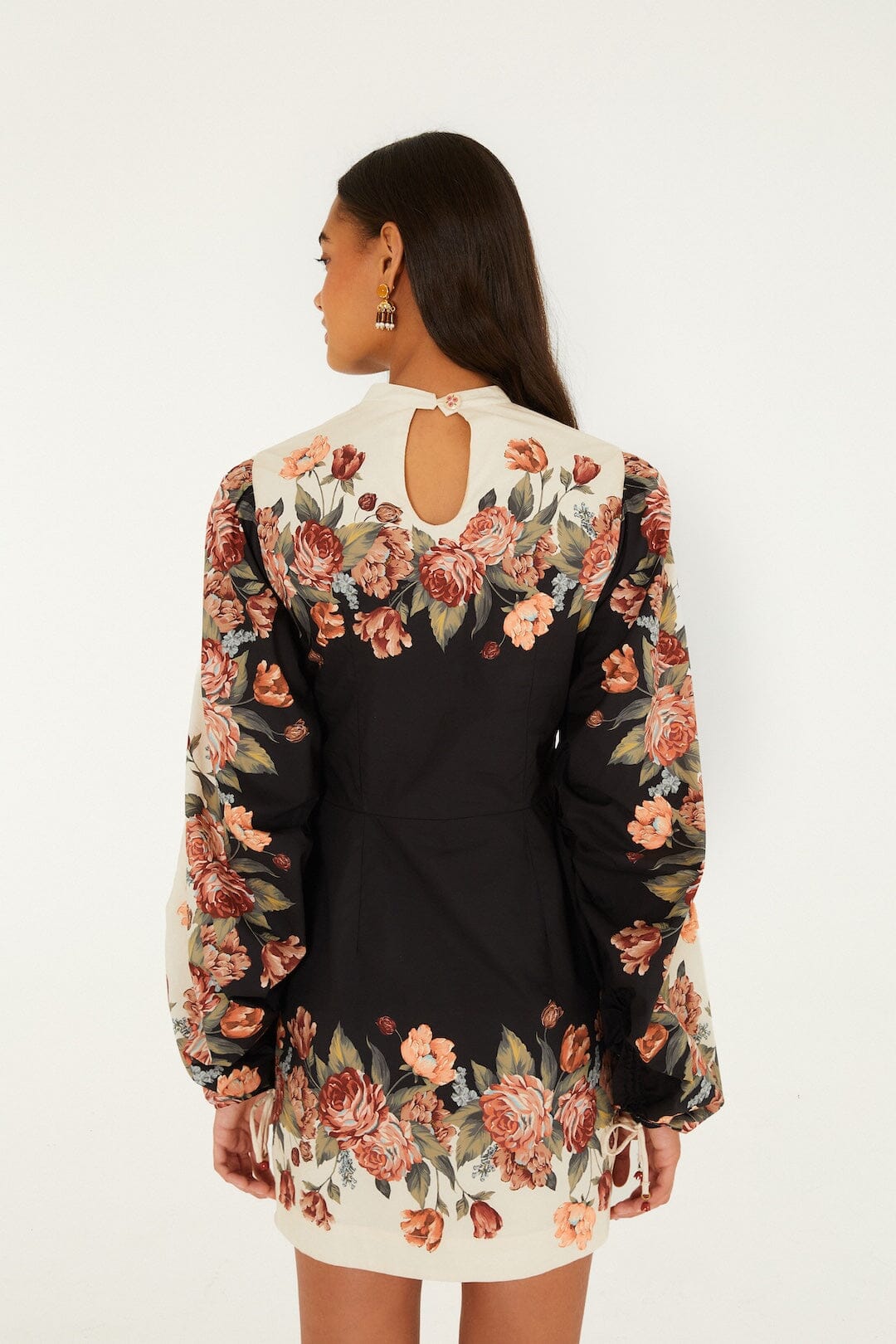 FARM Rio model wearing the Winter Floral Long Sleeve Mini Dress